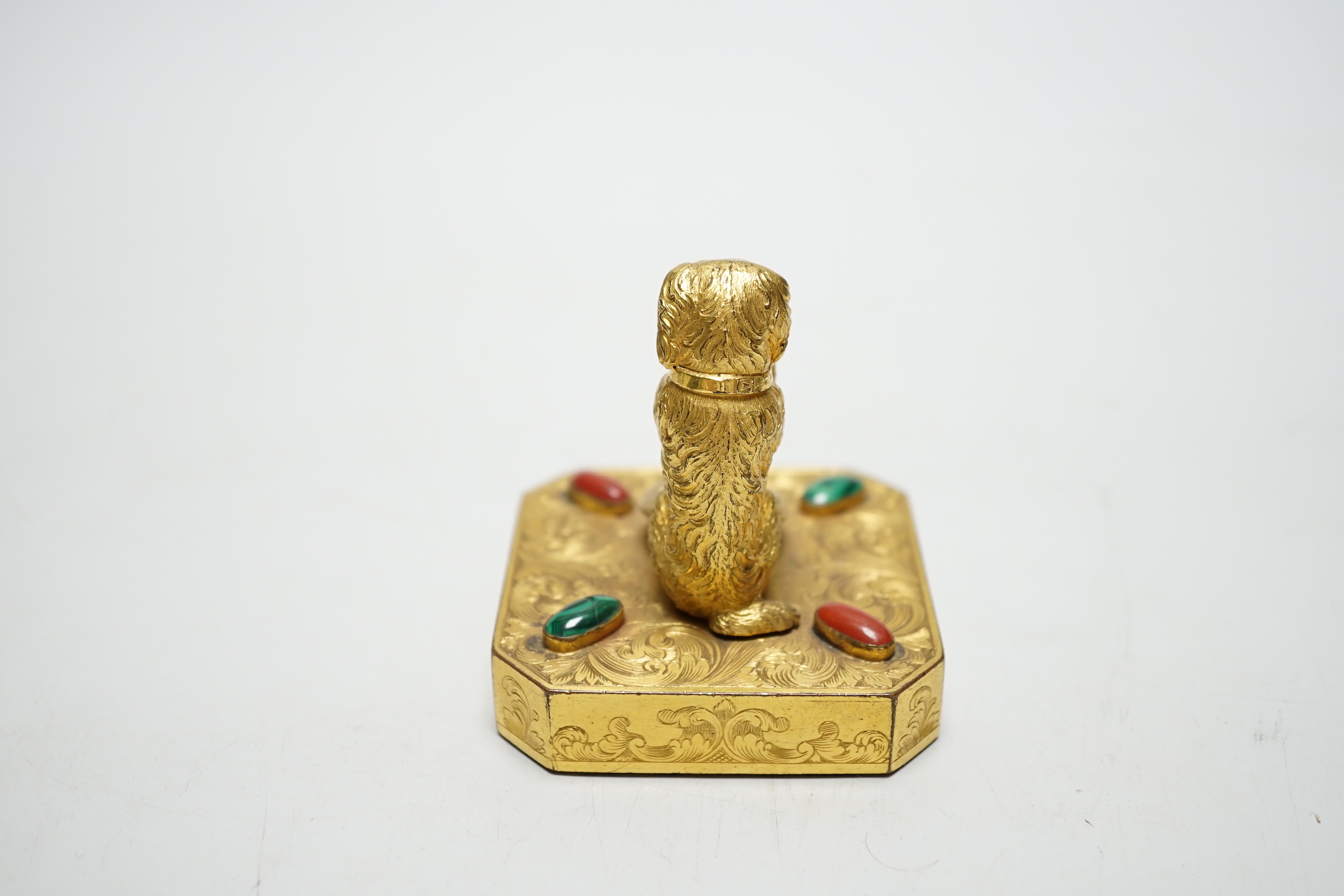 A 19th century Palais Royal ormolu ‘begging dog’ taper holder, 7cm